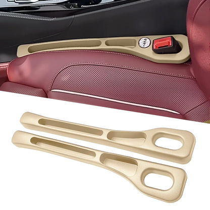 Beige seat gap organizer installed beside a seat with a matching pair shown below