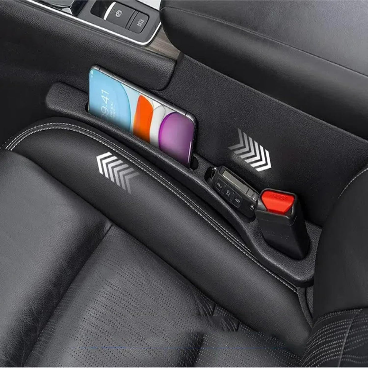 Black dual-slot seat gap organizer holding a phone and small accessories